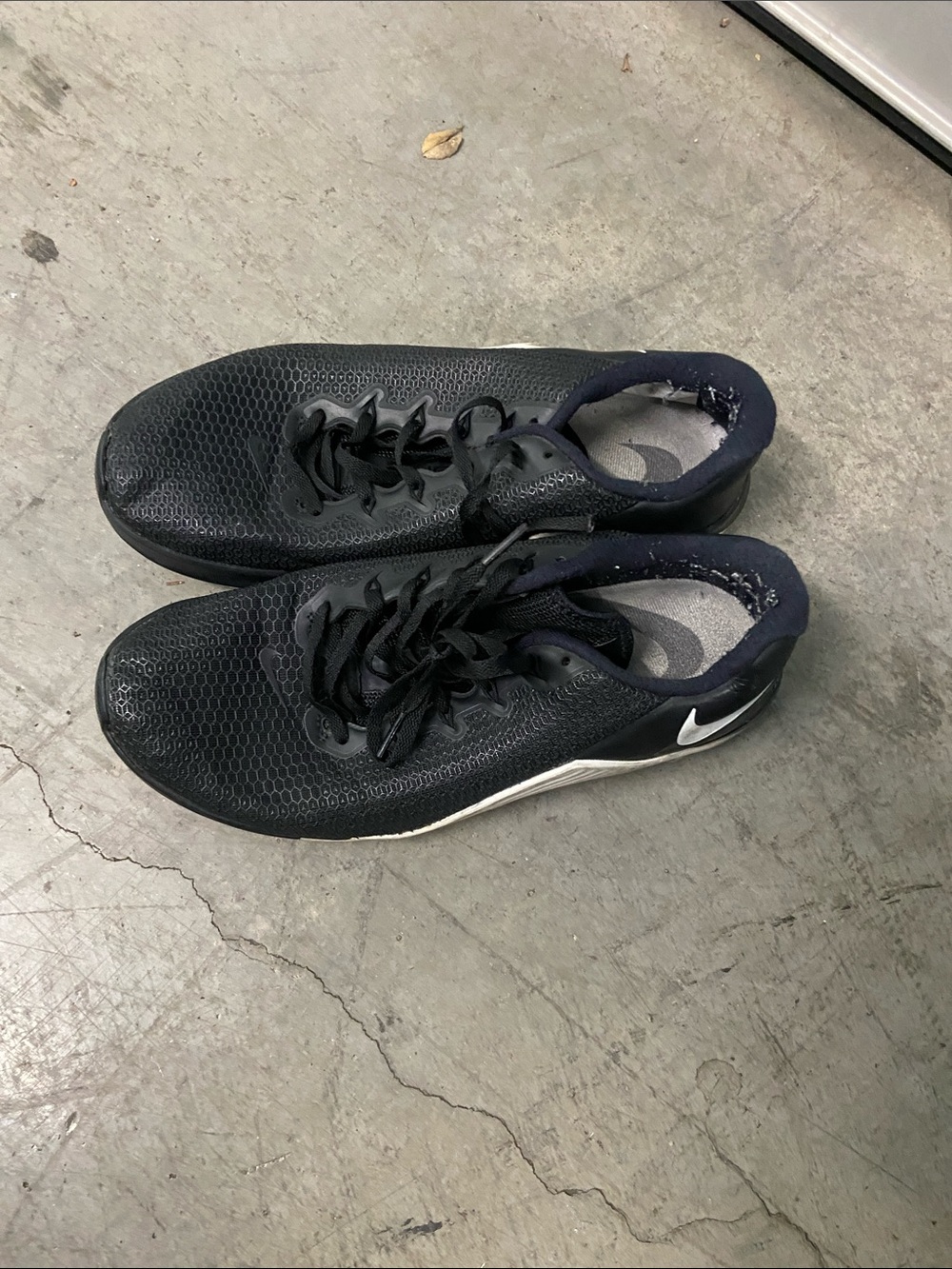 Nike Black Running Shoes with White Swoosh
